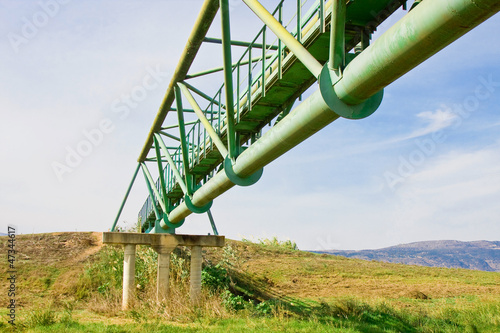 Metal bridge across a valley (from below)