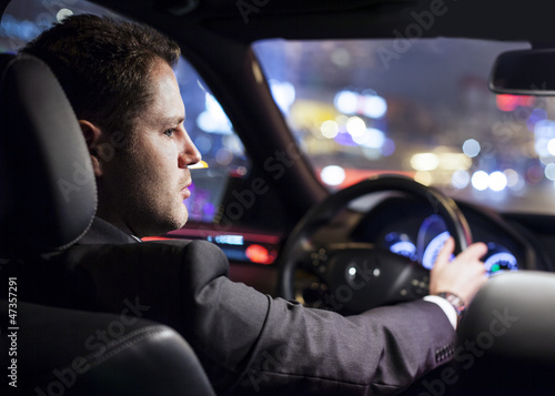 businessman driving car