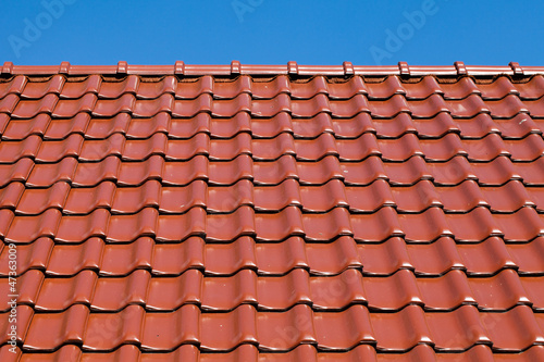 red roof with blue sky