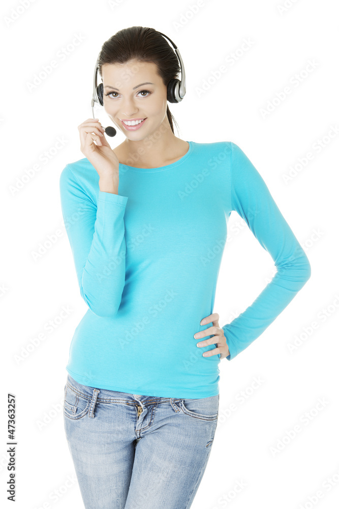 Beautiful young call-center assistant smiling Beautiful young call-center assistant smiling