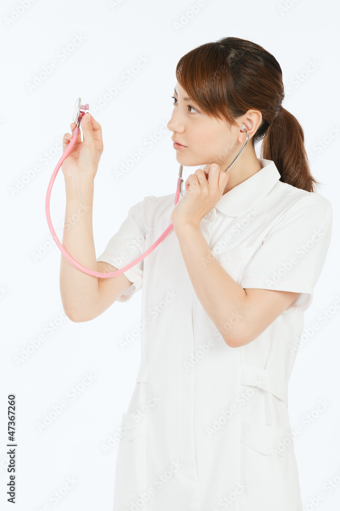 Beautiful young nurse on white background Beautiful young nurse on white background