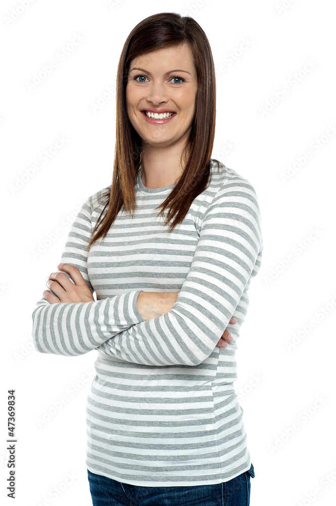 Cheerful lady in casual wear striking a pose Cheerful lady in casual wear striking a pose