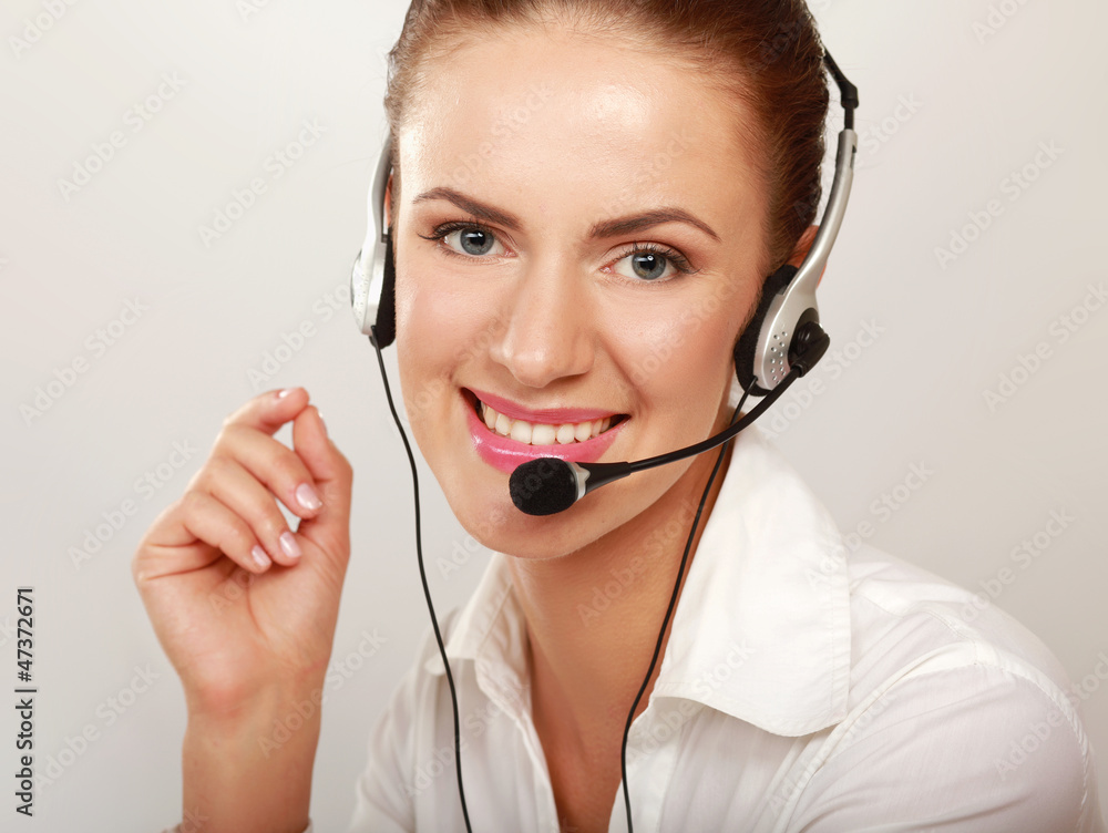 A smiling customer service girl isolated on white background A smiling customer service girl isolated on white background