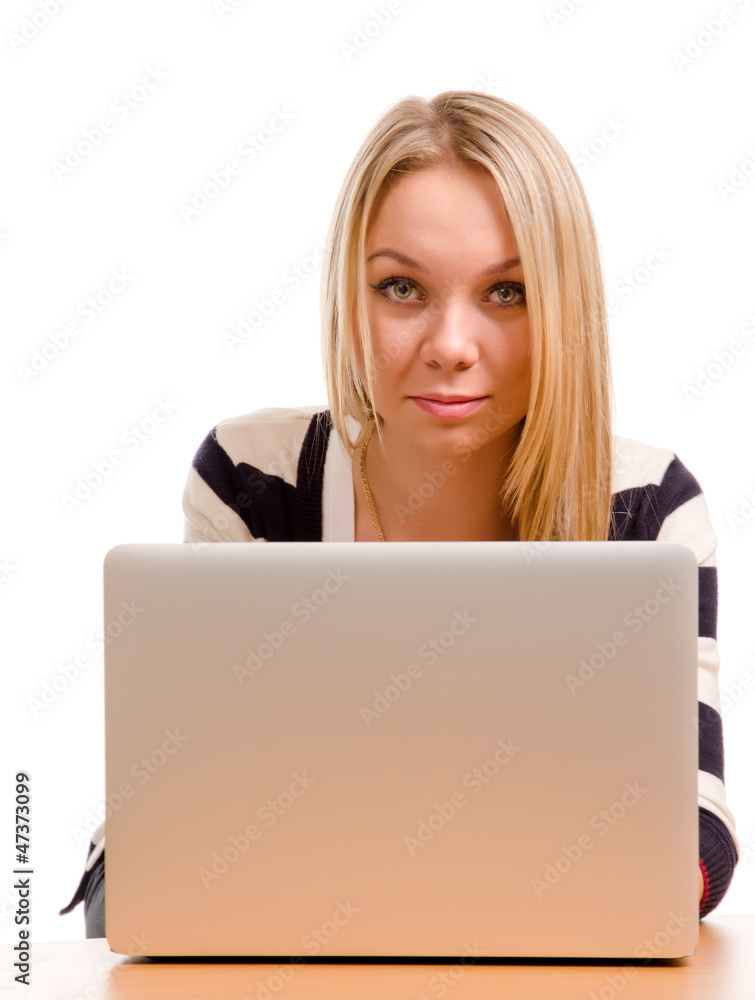 Stylish blonde woman working on a laptop Stylish blonde woman working on a laptop