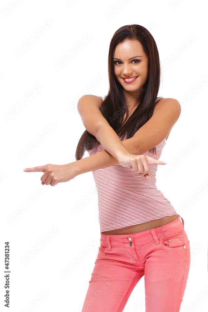 happy brunette student pointing at copyspace happy brunette student pointing at copyspace