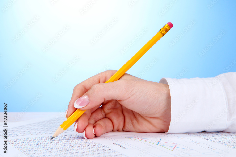 Closeup of businesswoman hand, writing on paper Closeup of businesswoman hand, writing on paper
