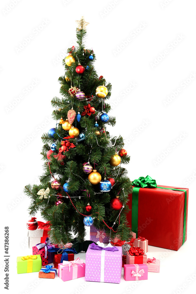 Decorated Christmas tree with gifts isolated on white Decorated Christmas tree with gifts isolated on white