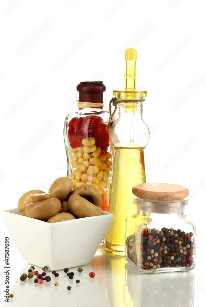 Delicious marinated mushrooms in bowl with spices isolated Delicious marinated mushrooms in bowl with spices isolated