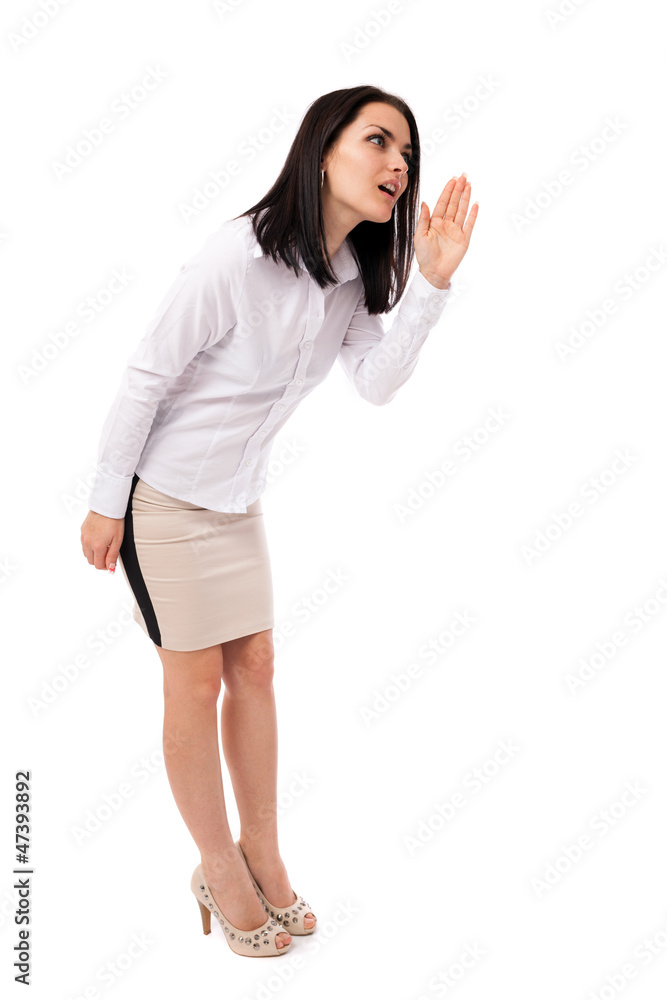 Beautiful young businesswoman telling a secret Beautiful young businesswoman telling a secret