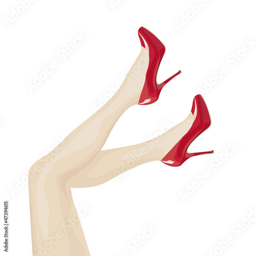 Female legs in high heels over white background