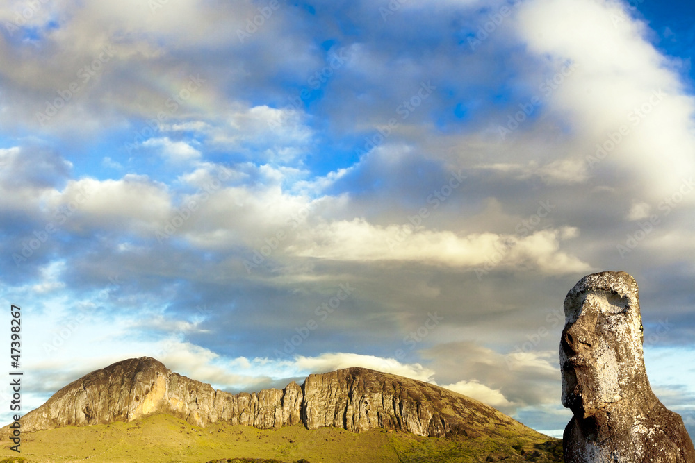Head of moai with mountain in background in Easter Island