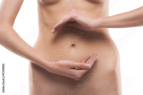 hands in figure above belly