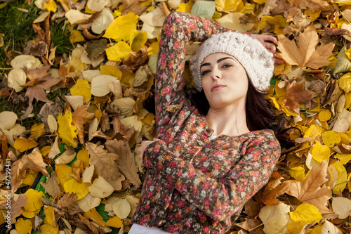 Young woman laying in the a...