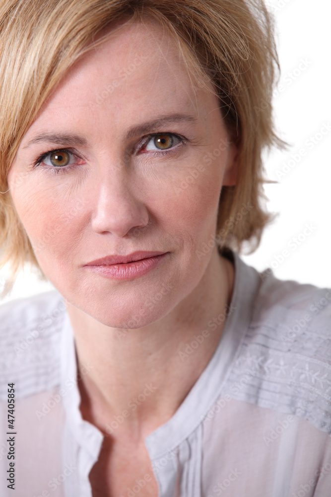Woman with neutral expression. Woman with neutral expression.