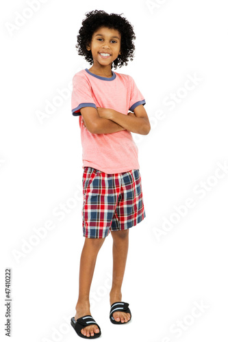 Mixed race boy standing