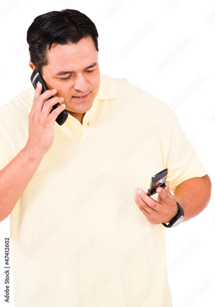 Latin American man using phone Latin American man using phone