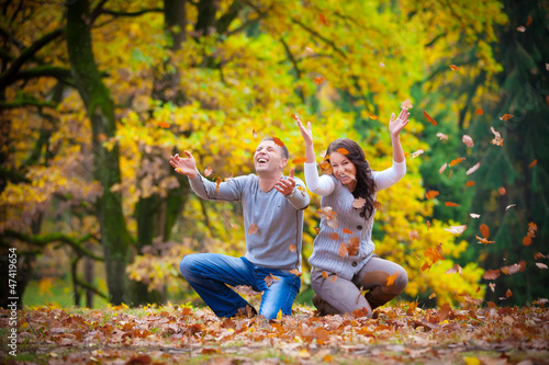 Portrait of couple enjoying golden autumn fall season © Andriy Petrenko