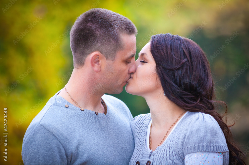 Portrait of couple enjoying golden autumn fall season Portrait of couple enjoying golden autumn fall season