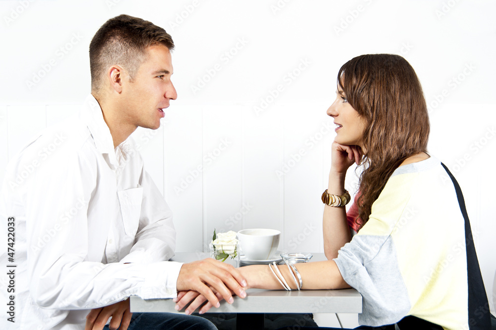 Couple on date in restaurant man and woman Couple on date in restaurant man and woman