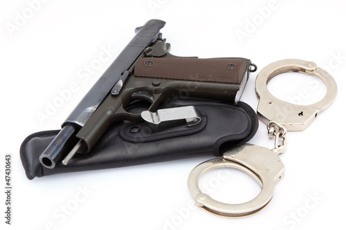 Handgun automatic and handcuff