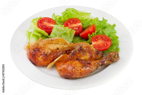 fried chicken with salad on the plate on white background