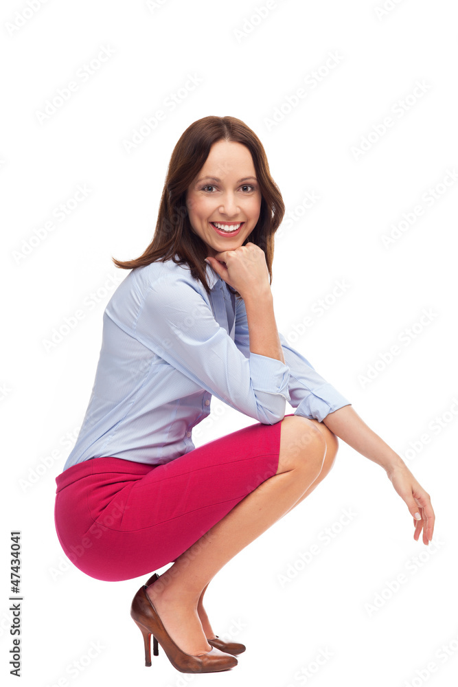 Businesswoman crouching Businesswoman crouching