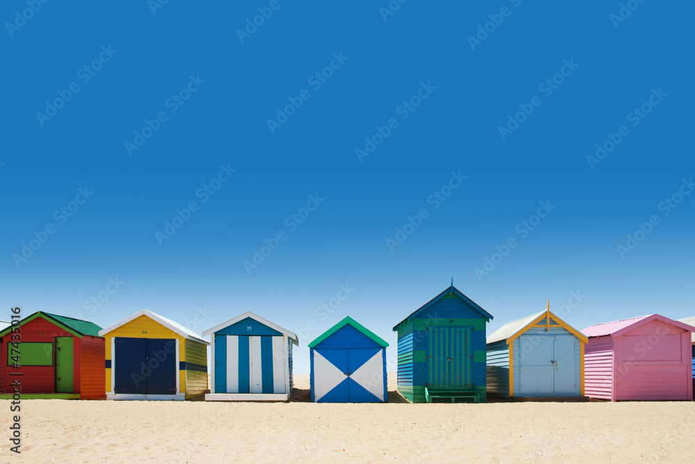 Beautiful bathing houses on white sand beach - obrazy, fototapety, plakaty 