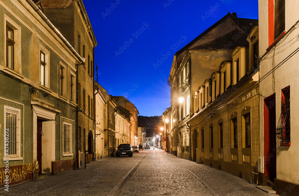 Brasov medieval street, night view. Romania