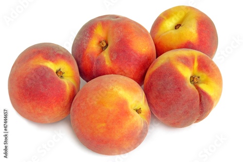 golden and red sweet peaches