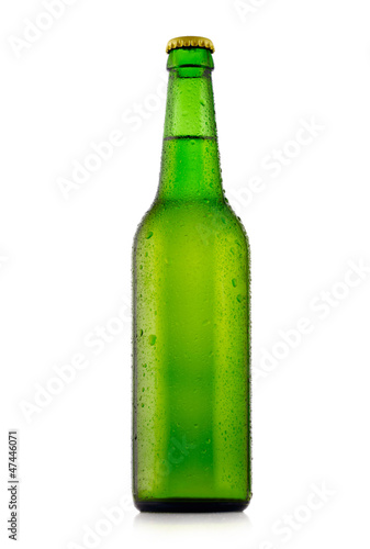 Bottle of beer with waterdrops. Isolated on white background