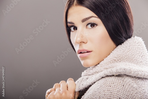 Young woman in winter clothes