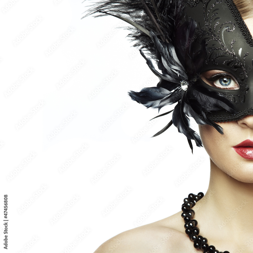 Beautiful young woman in black mysterious venetian mask Stock-Foto | Adobe  Stock