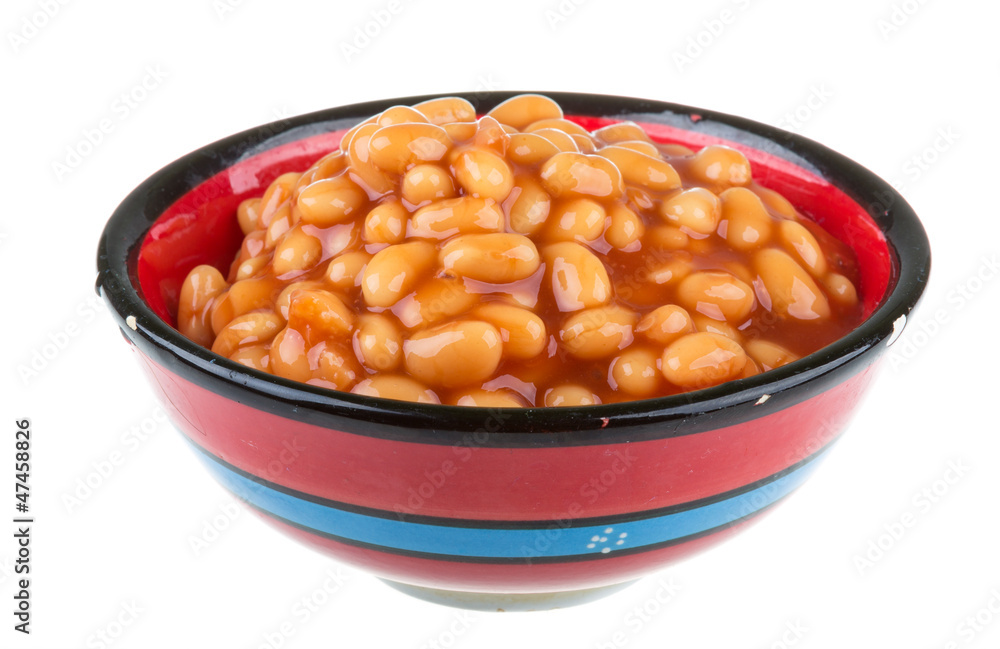 Marinated haricot beans in tomato sauce with shallots on a plate Marinated haricot beans in tomato sauce with shallots on a plate