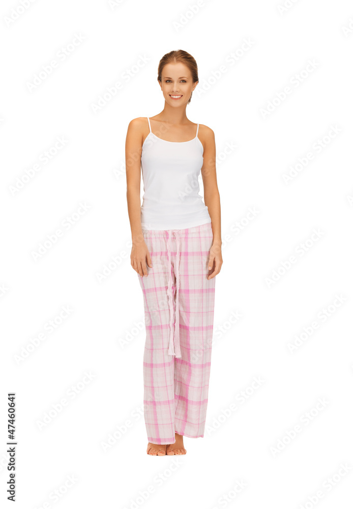 happy and smiling woman in cotton pajamas happy and smiling woman in cotton pajamas