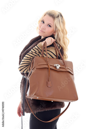 young attractive model posing with handbag