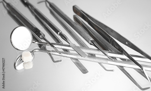 Set of dental tools for teeth care isolated on grey background