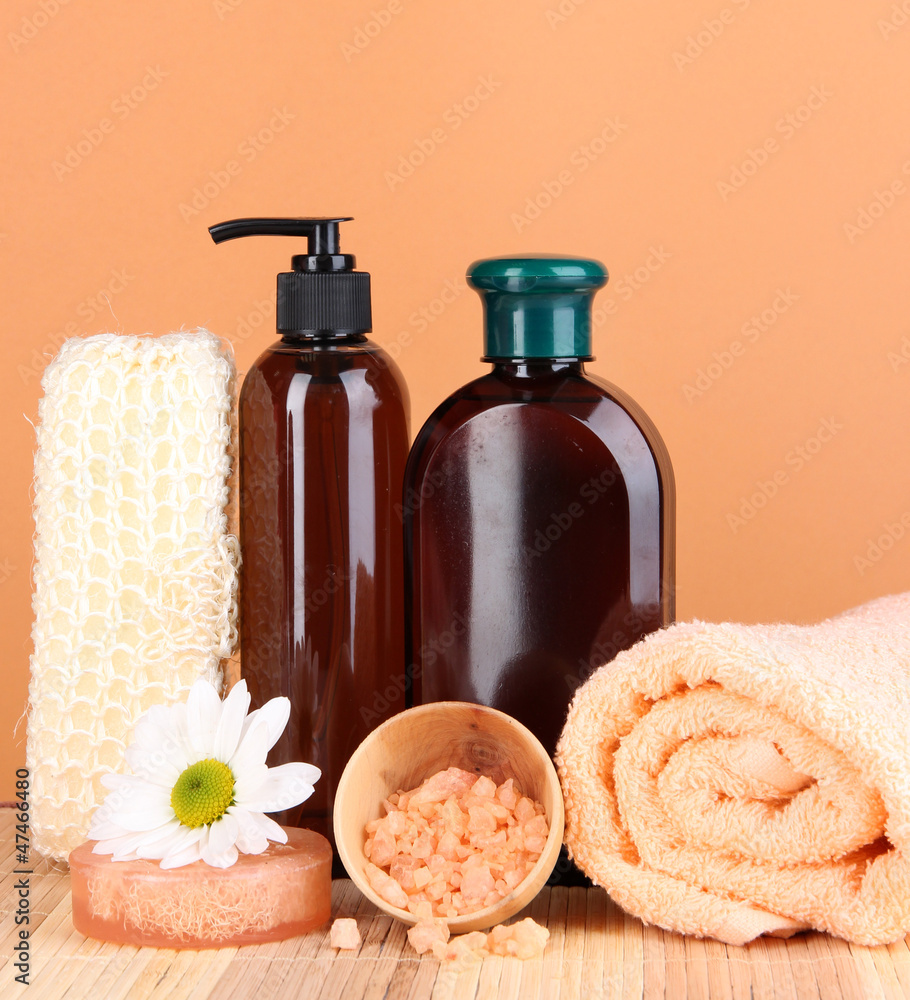 Set for care of a body on peach background Set for care of a body on peach background
