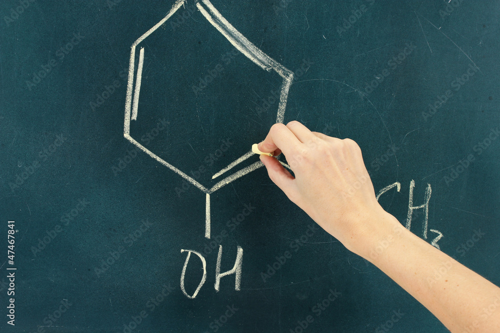 Chemical structure formula written on blackboard with chalk.