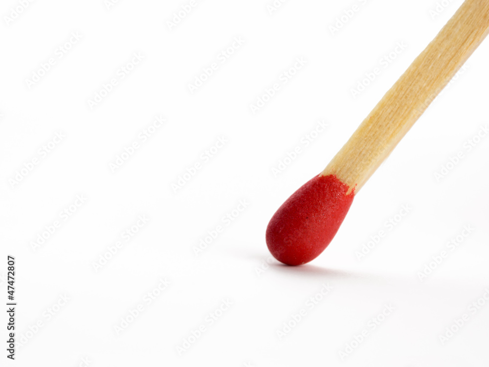 a red match isolated on white background a red match isolated on white background