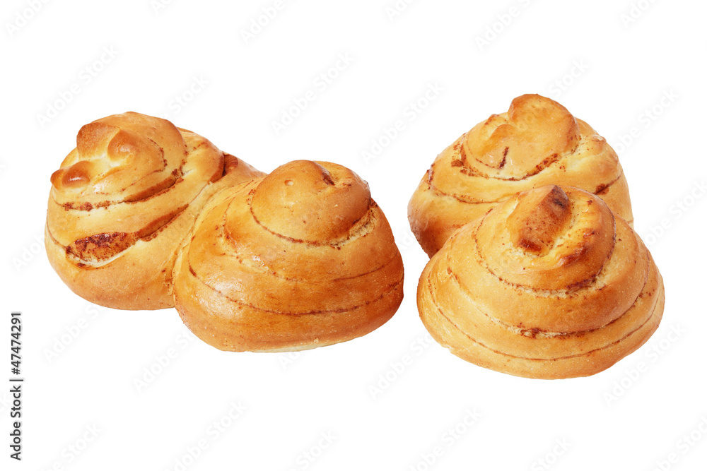Two sweet buns with cinnamon isolated on white background. Two sweet buns with cinnamon isolated on white background.