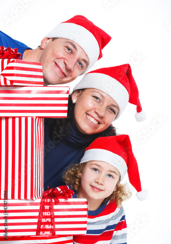 Family with Christmas presents