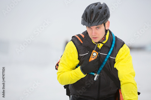 Young Courier Delivery Man Using Walkie-Talkie