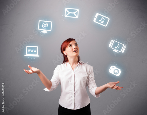 pretty girl juggling with elecrtonic devices icons