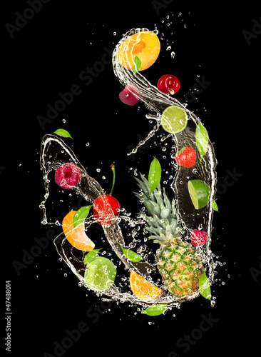  Fresh fruits falling in water splash on black background