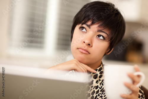 Pretty Mixed Race Woman Hol...