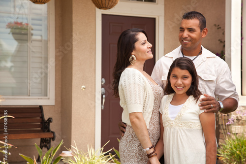 Small Happy Hispanic Family...
