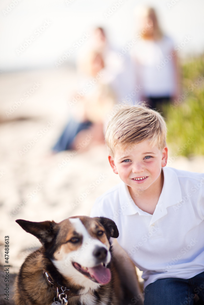 Handsome Young Boy Playing with His Dog Handsome Young Boy Playing with His Dog