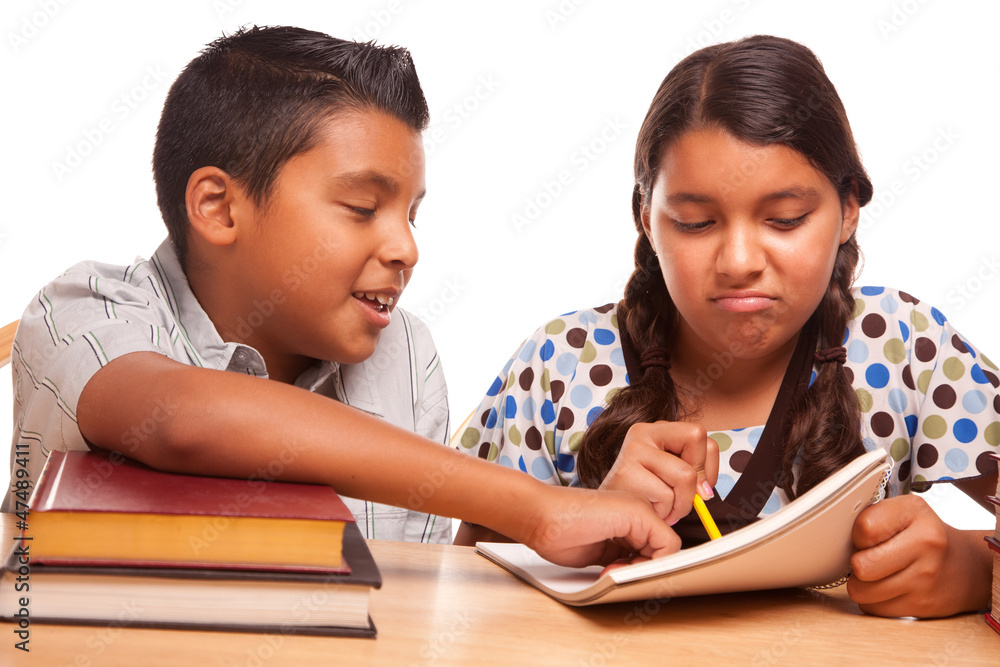 Hispanic Brother and Sister Having Fun Studying Hispanic Brother and Sister Having Fun Studying