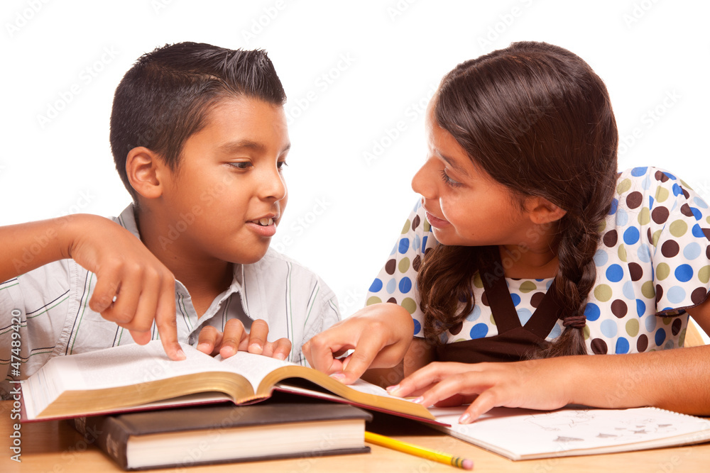 Hispanic Brother and Sister Having Fun Studying Hispanic Brother and Sister Having Fun Studying