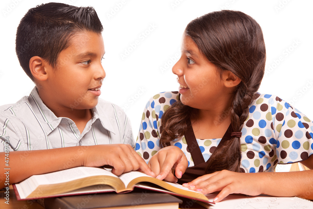 Hispanic Brother and Sister Having Fun Studying Hispanic Brother and Sister Having Fun Studying